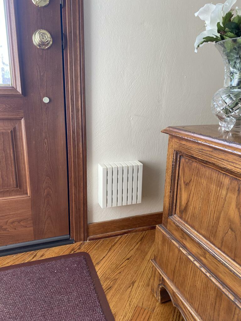 CL-W Wired Door Chime by Crafmade Installed on Wall Near Door