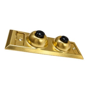 Angled view of the Lee Electric BC203 showing the raised brass button domes and name plate pockets
