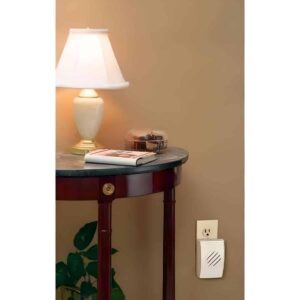 RC3733D compact door Chime receiver near table